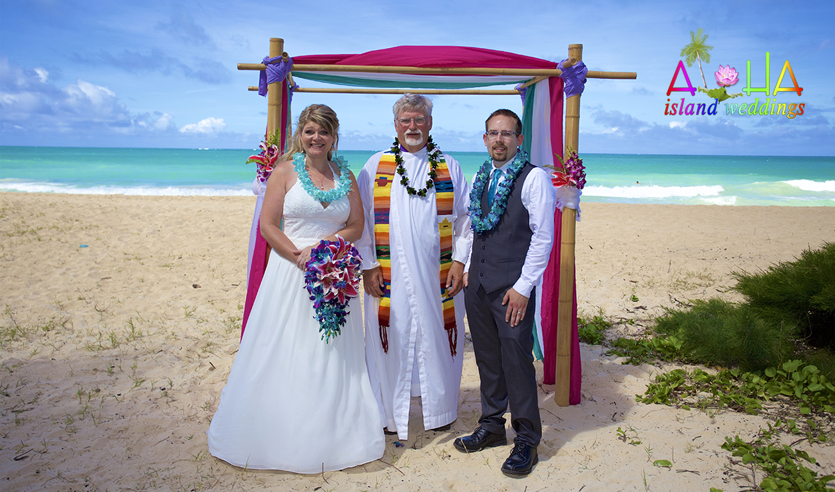 Minister performing a beach ceremony for his son and new daughter-in-law